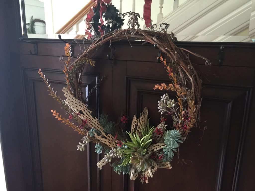Hang an autumn wreath on a hall tree, chair rail or wall hooks. - IMG_5280